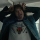 Joseph Quinn as Eddie Munson in Stranger Things making a goofy face.